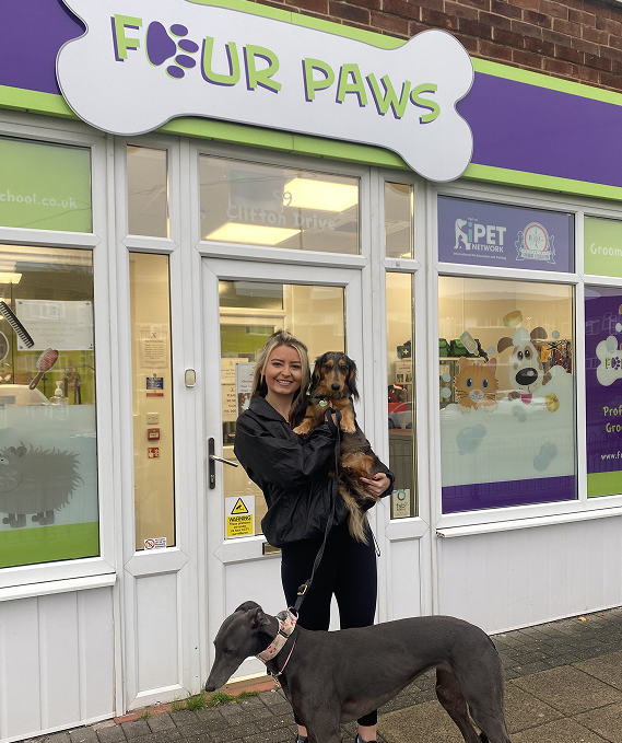Qualified Dog Groomer Alicia outside Four Paws Groom School with a Level 3 Diploma in Dog Grooming
